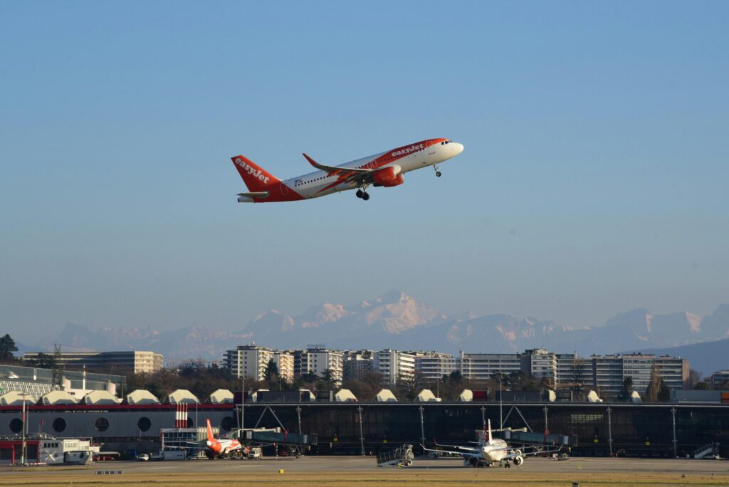 pexels photo 30663195 30663195 An EasyJet plane taking off from Geneva Airport with mountains in the background.